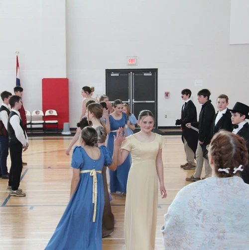 Students learn to dance reels in the Regency Country Dance fashion during Regency Day on March 27. This event takes place after the students read Jane Austen’s novel, “Pride and Prejudice,” which takes place in the early 1800s. This day is designed to teach students more about this time period in England by immersing them in the culture. 